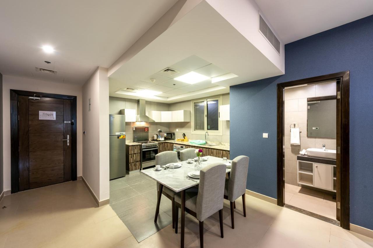 Luxe Grand Hotel Apartments Sharjah Exterior foto A typical apartment at the complex